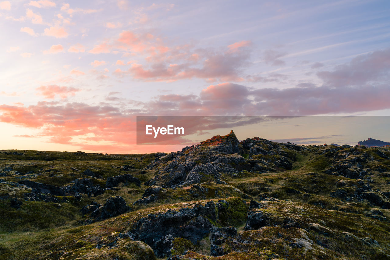 Scenic view of landscape against sky during sunset