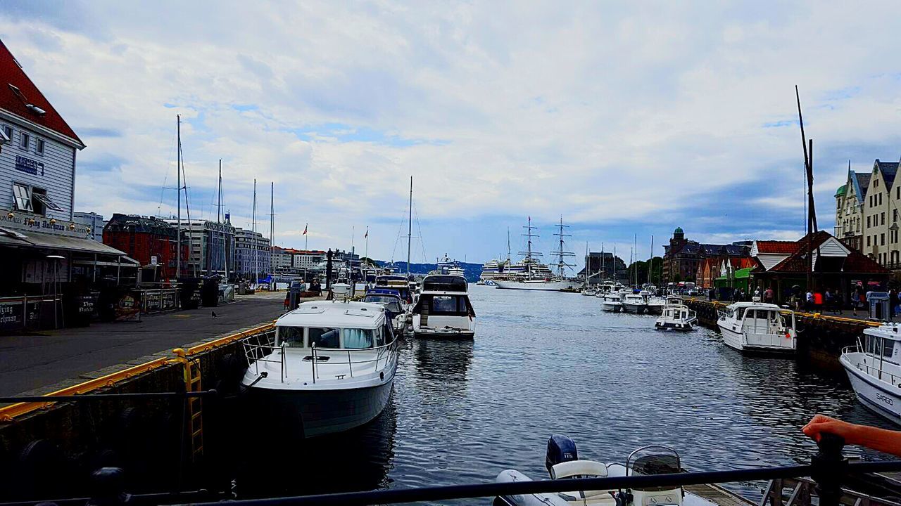 BOATS MOORED IN HARBOR