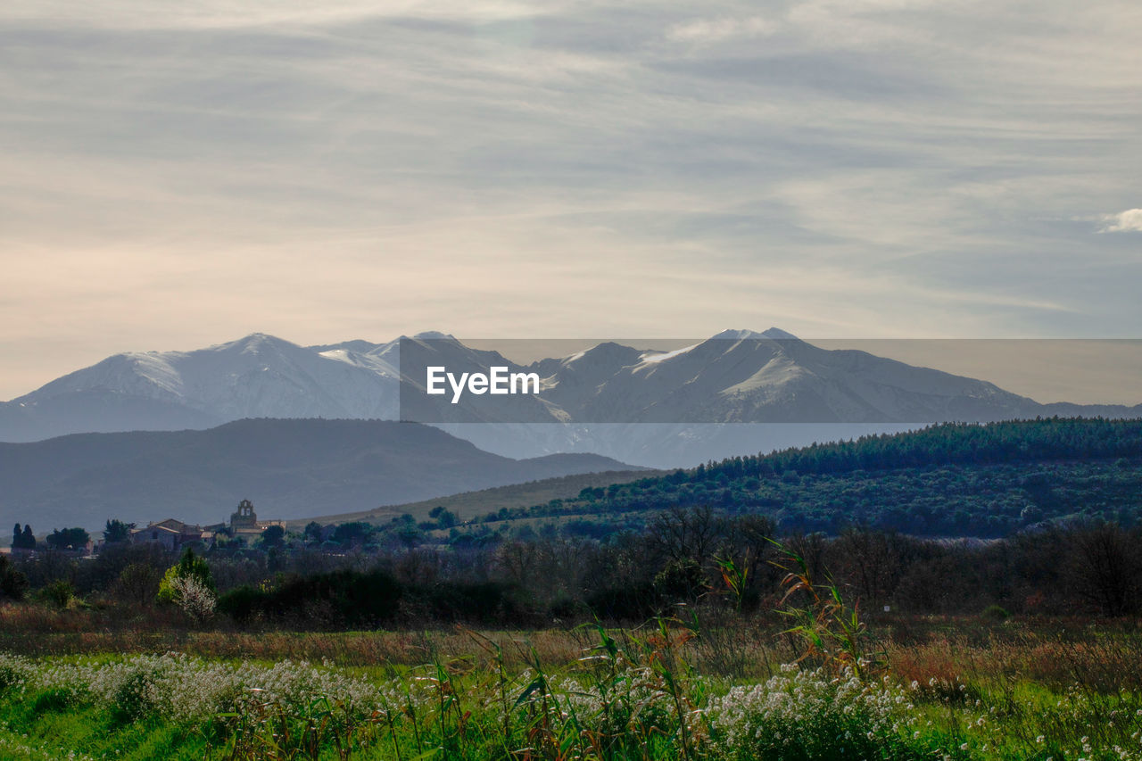 Scenic view of mountains against sky