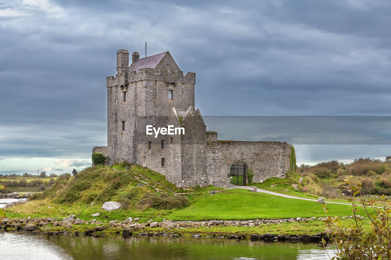 Dunguaire castle is a 16th-century tower house on the southeastern shore of galway bay, ireland