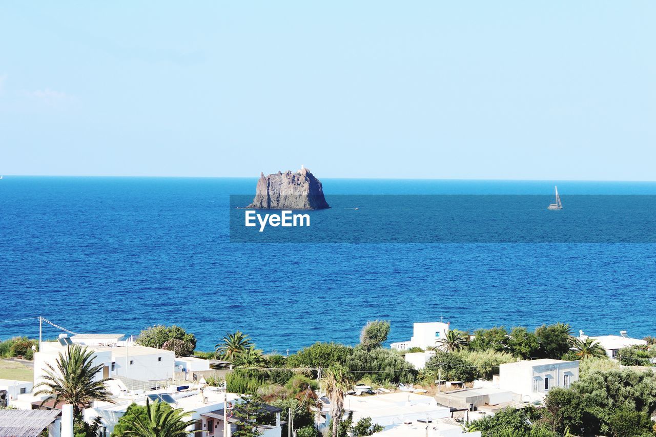 Scenic view of sea against clear sky