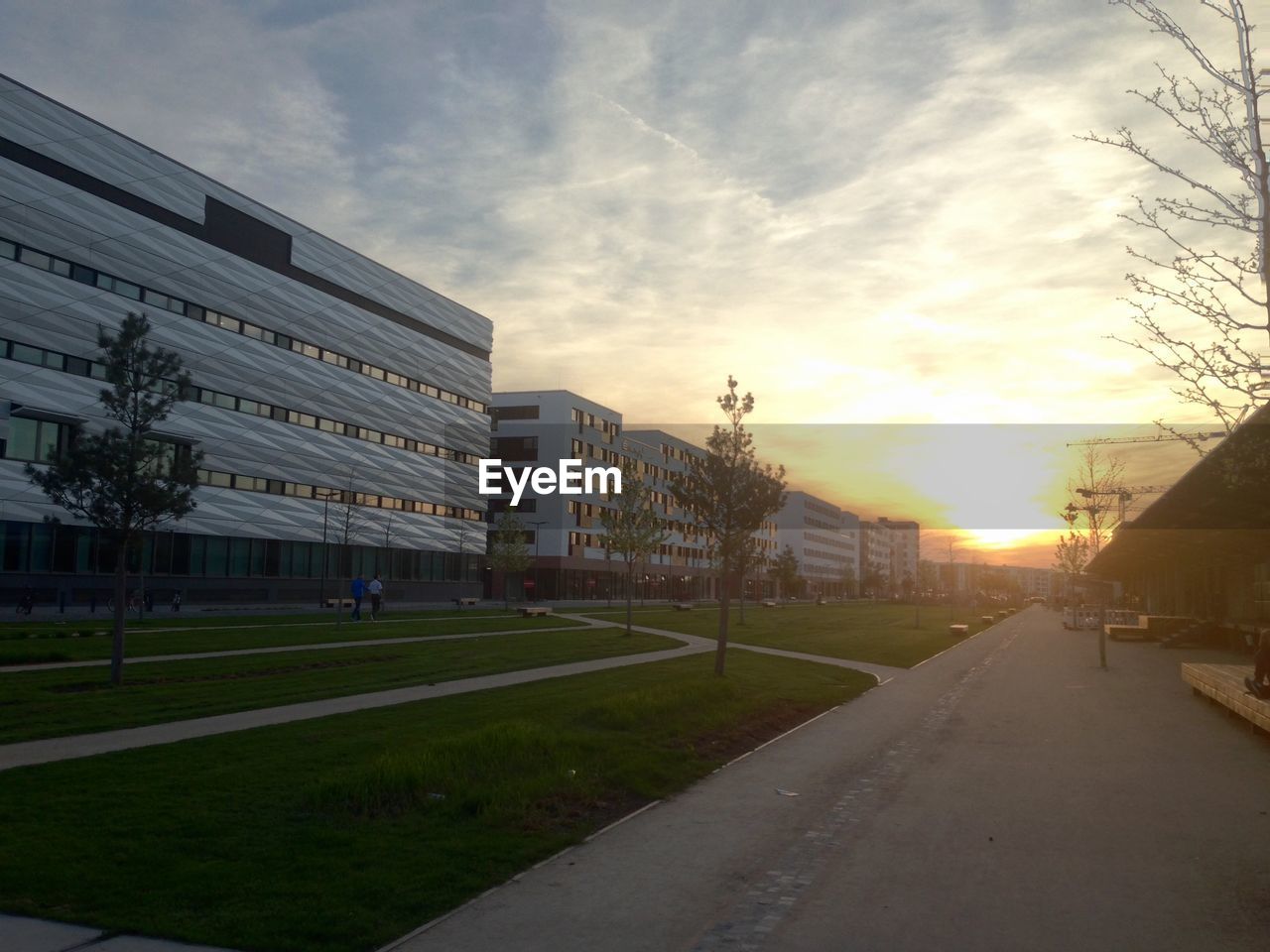 ROAD WITH BUILDINGS IN BACKGROUND