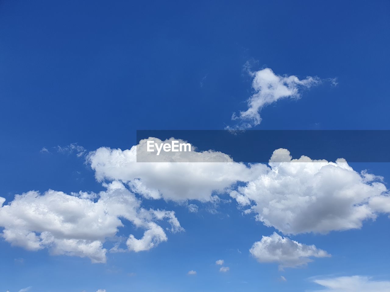 Low angle view of clouds in blue sky