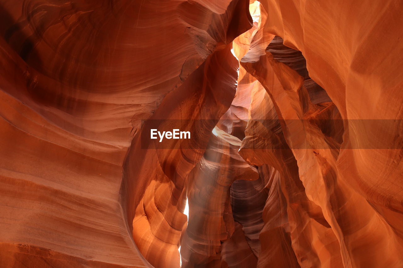 LOW ANGLE VIEW OF ROCK FORMATIONS IN A CANYON
