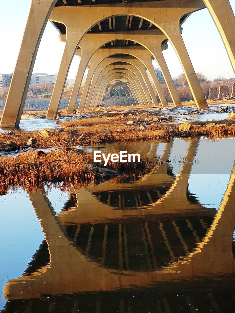 HIGH ANGLE VIEW OF BRIDGE OVER WATER