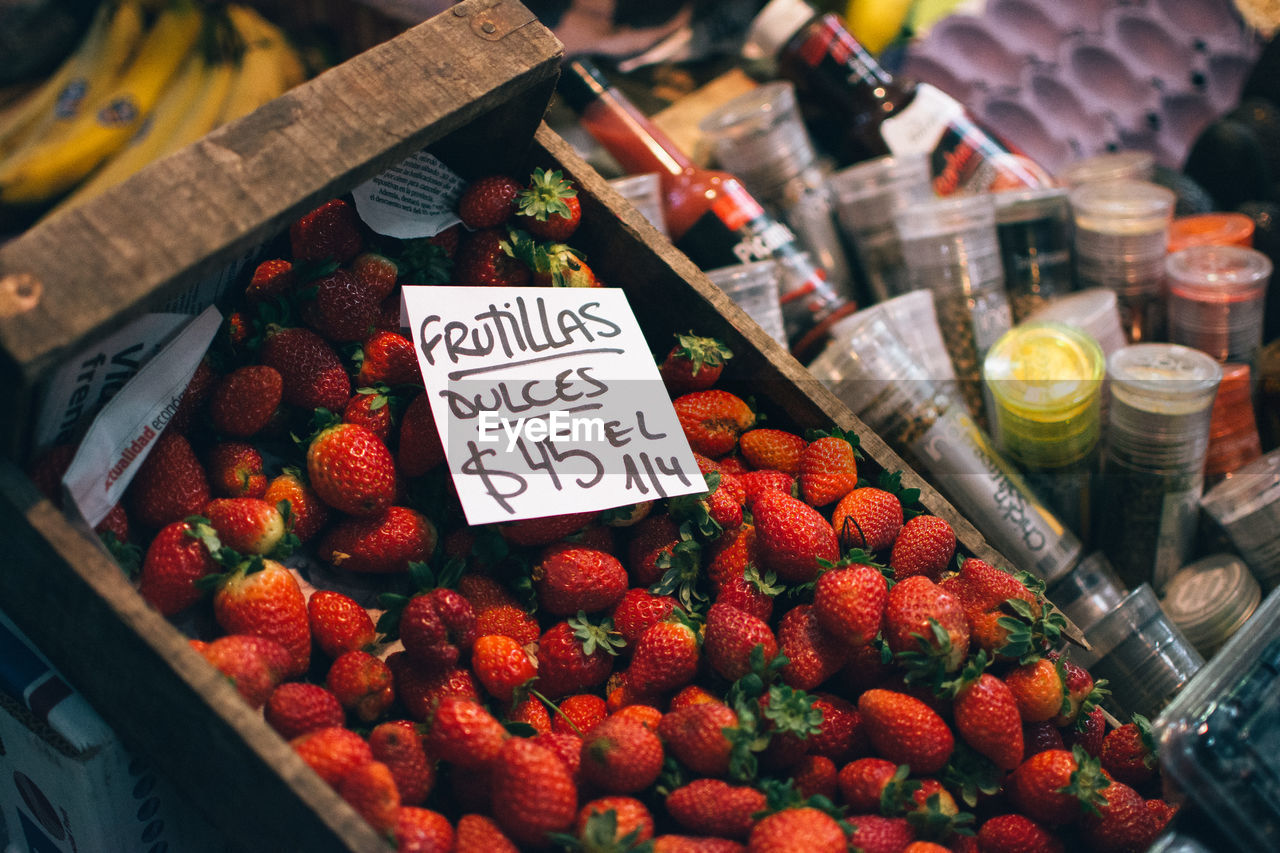 High angle view of strawberries on wooden basket