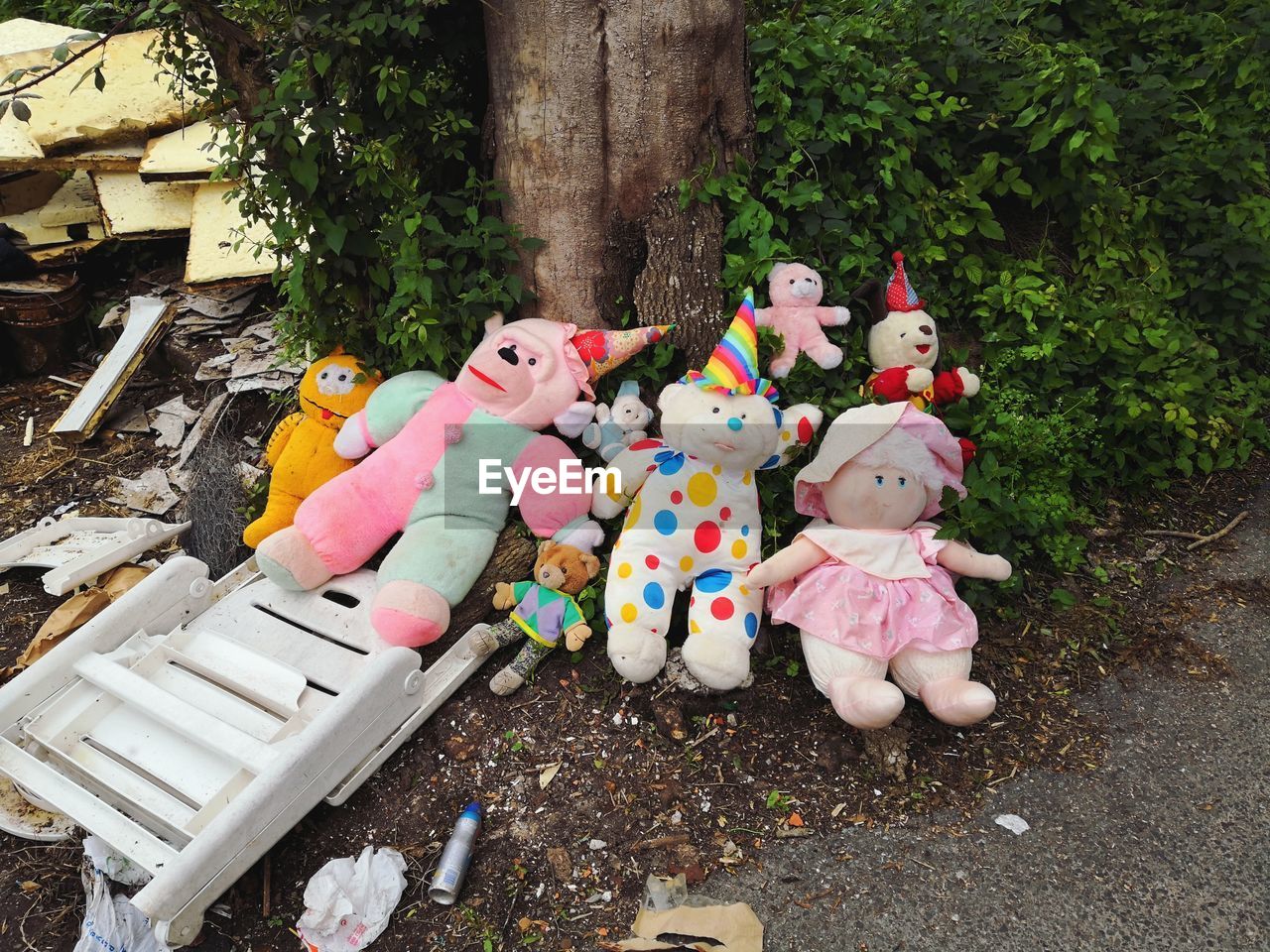 HIGH ANGLE VIEW OF STUFFED TOY BY TREES