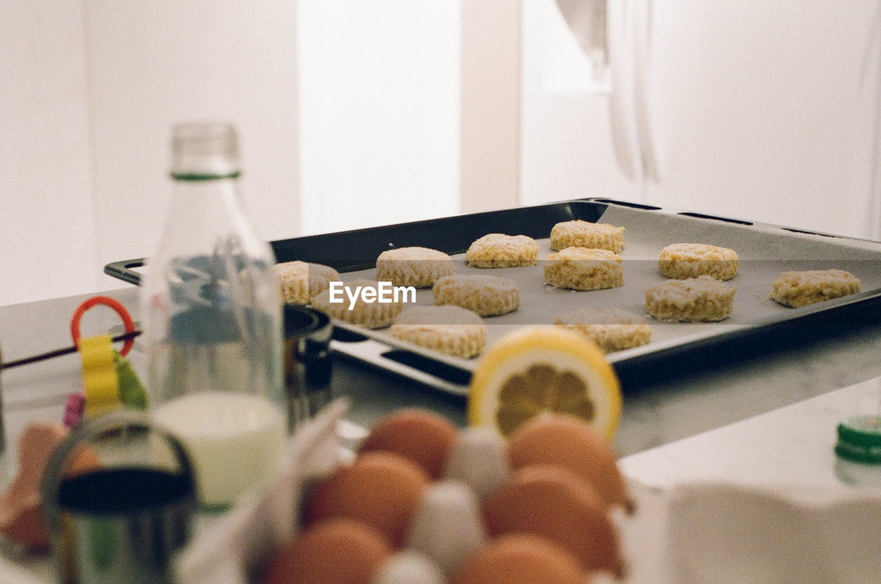 Scones in tray on table at home