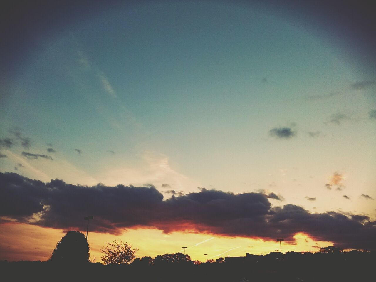 Silhouette landscape against the sky