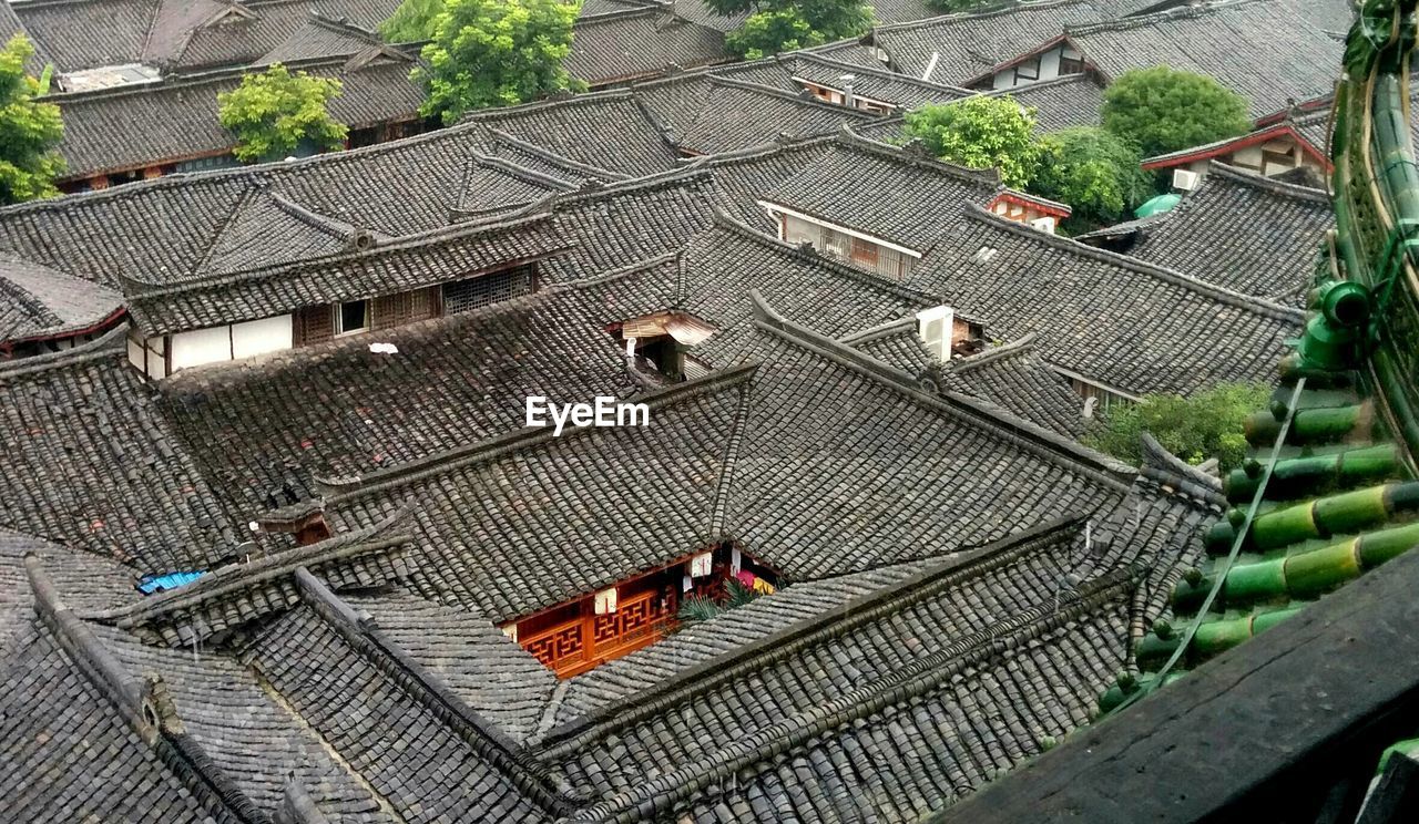 High angle view of rooftops on traditional houses in town