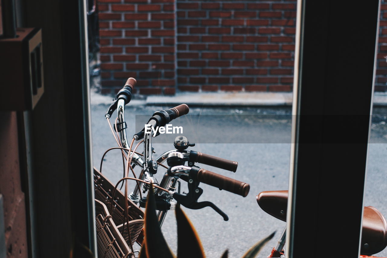 Bicycle against brick wall