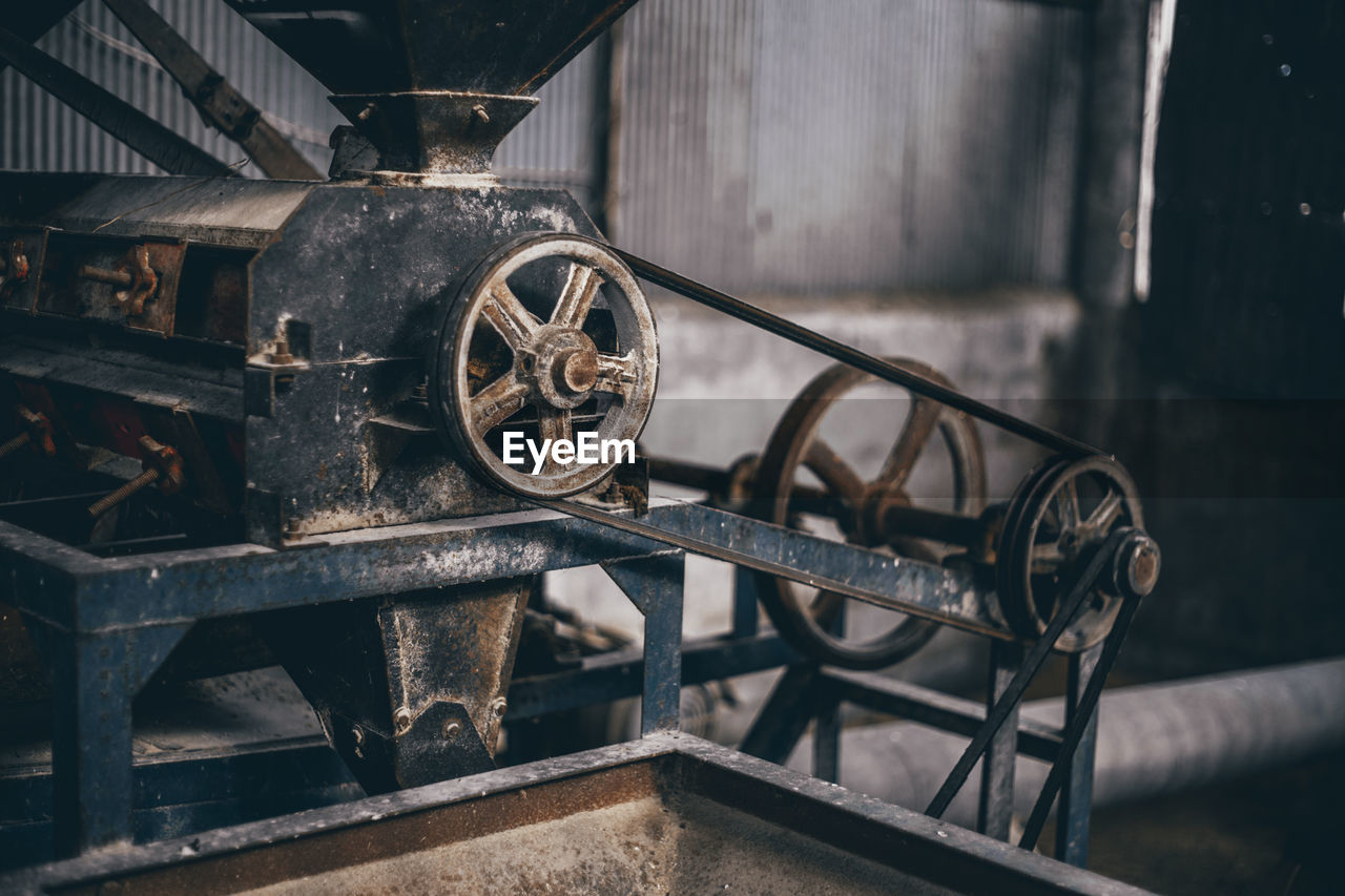 Close-up of old machinery in factory