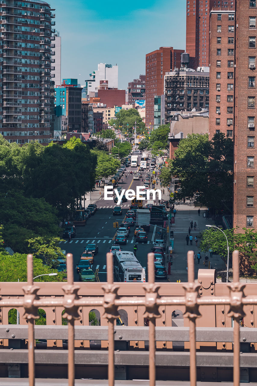 Aerial view of city buildings against sky