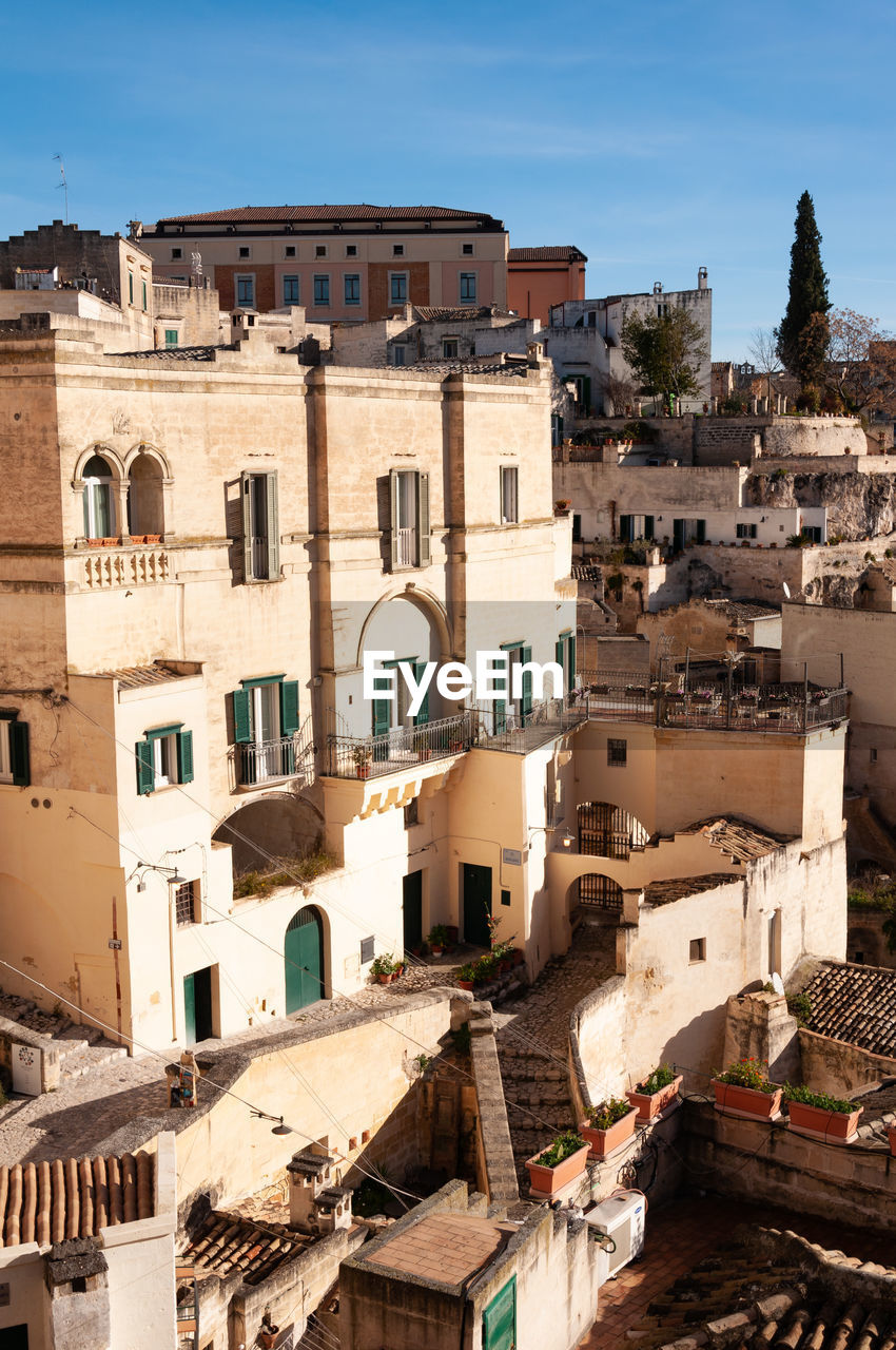 High angle view of residential buildings against sky