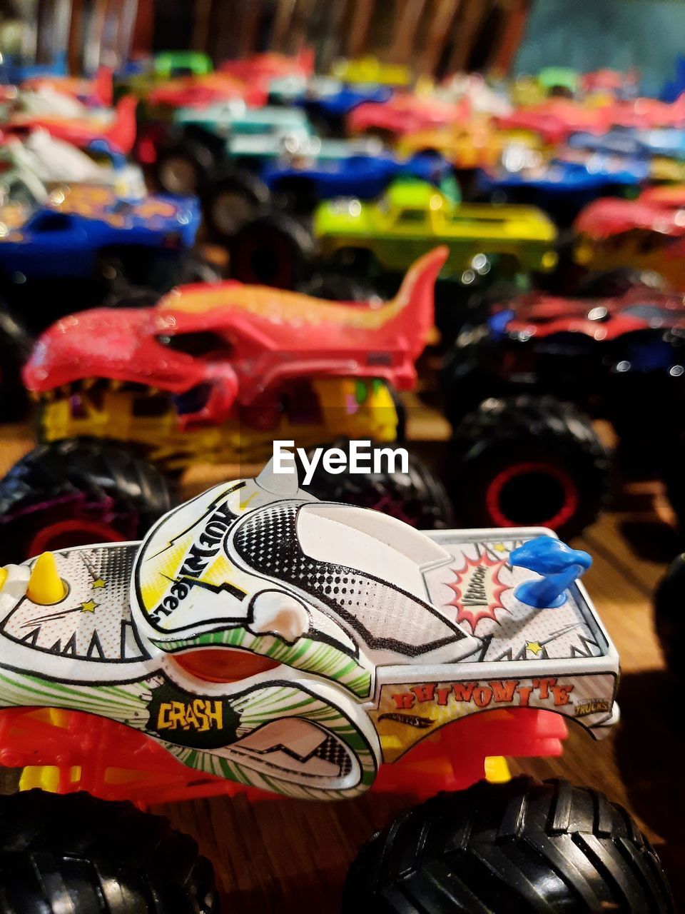 racing, multi colored, focus on foreground, race track, no people, race, variation, vehicle, toy, car, close-up, retail, large group of objects