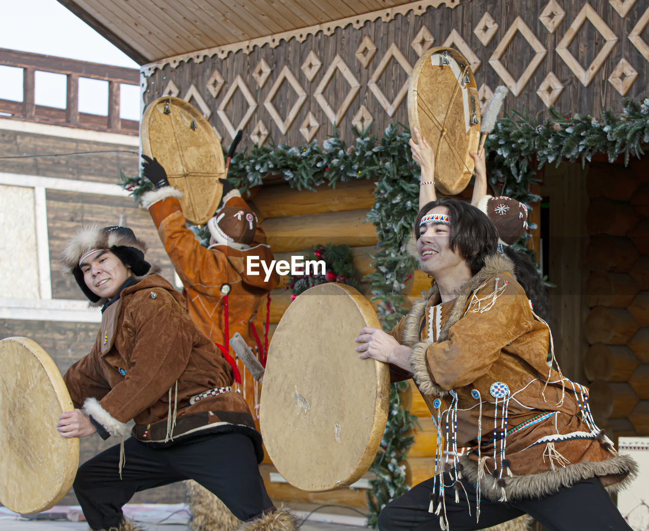 drum, musical instrument, music, adult, drum - percussion instrument, arts culture and entertainment, musical equipment, performance, architecture, togetherness, sitting, musician, men, clothing, group of people, women, membranophone, happiness, lifestyles, tradition, traditional clothing, young adult, emotion, friendship, hand drum, leisure activity, smiling, celebration, enjoyment