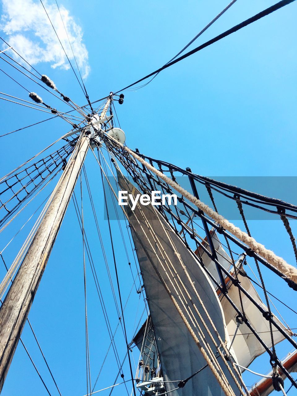 LOW ANGLE VIEW OF MAST AGAINST CLEAR SKY