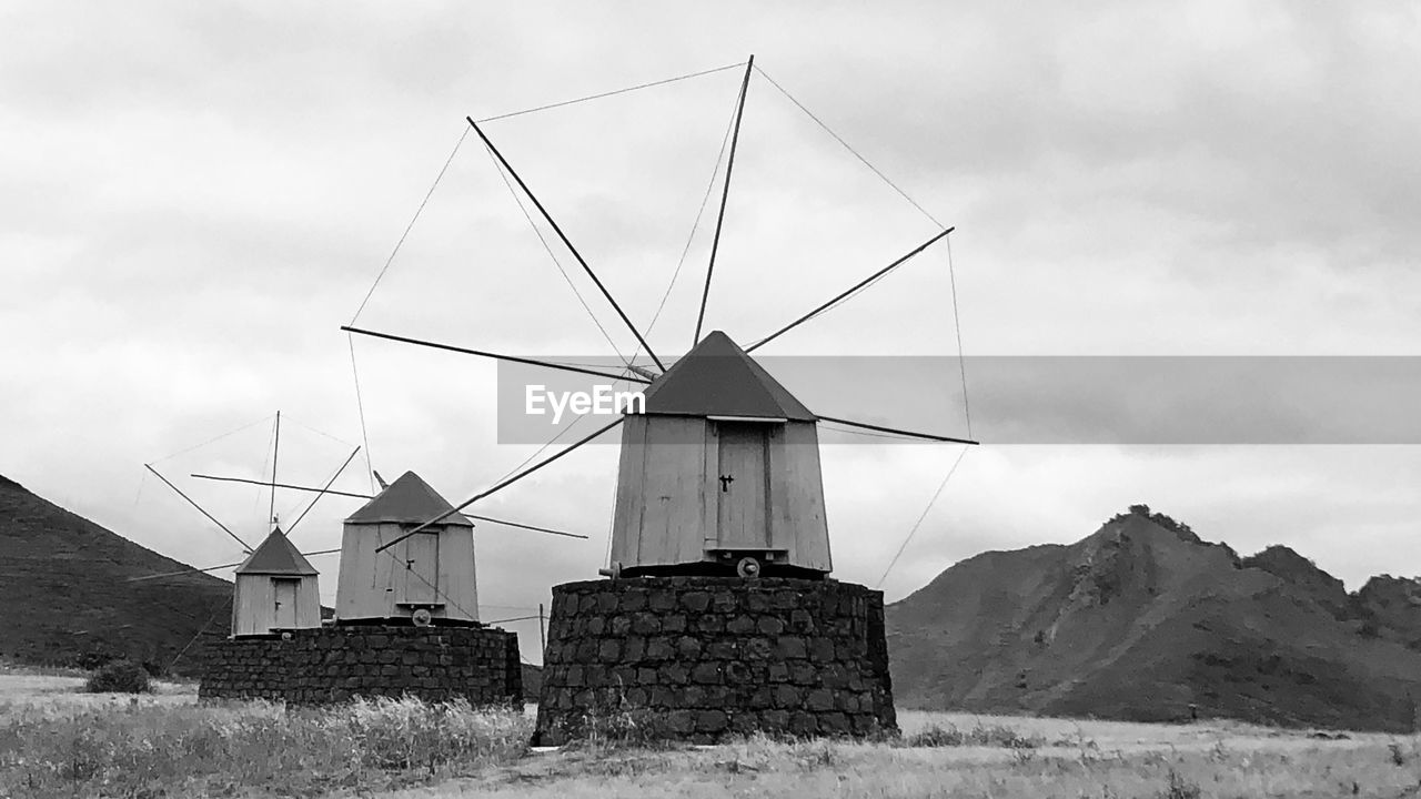 TRADITIONAL WINDMILL ON FIELD