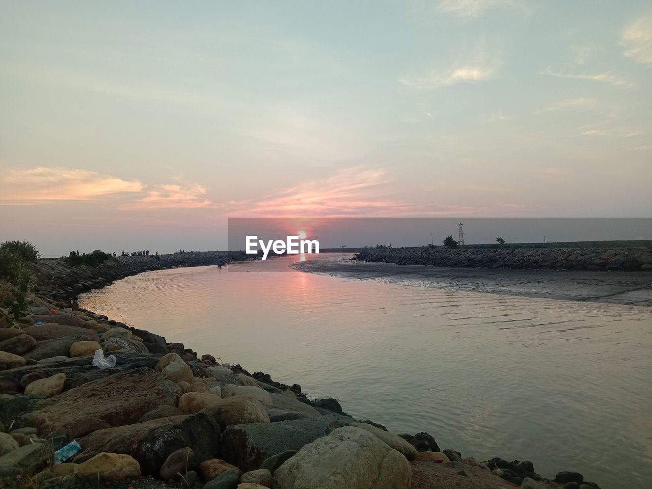 SCENIC VIEW OF SEA DURING SUNSET