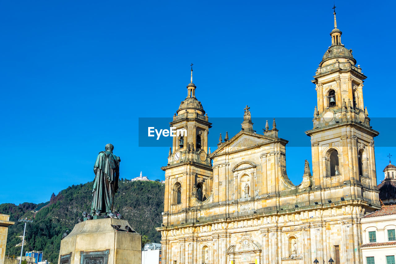 Primatial cathedral of bogota against clear blue sky