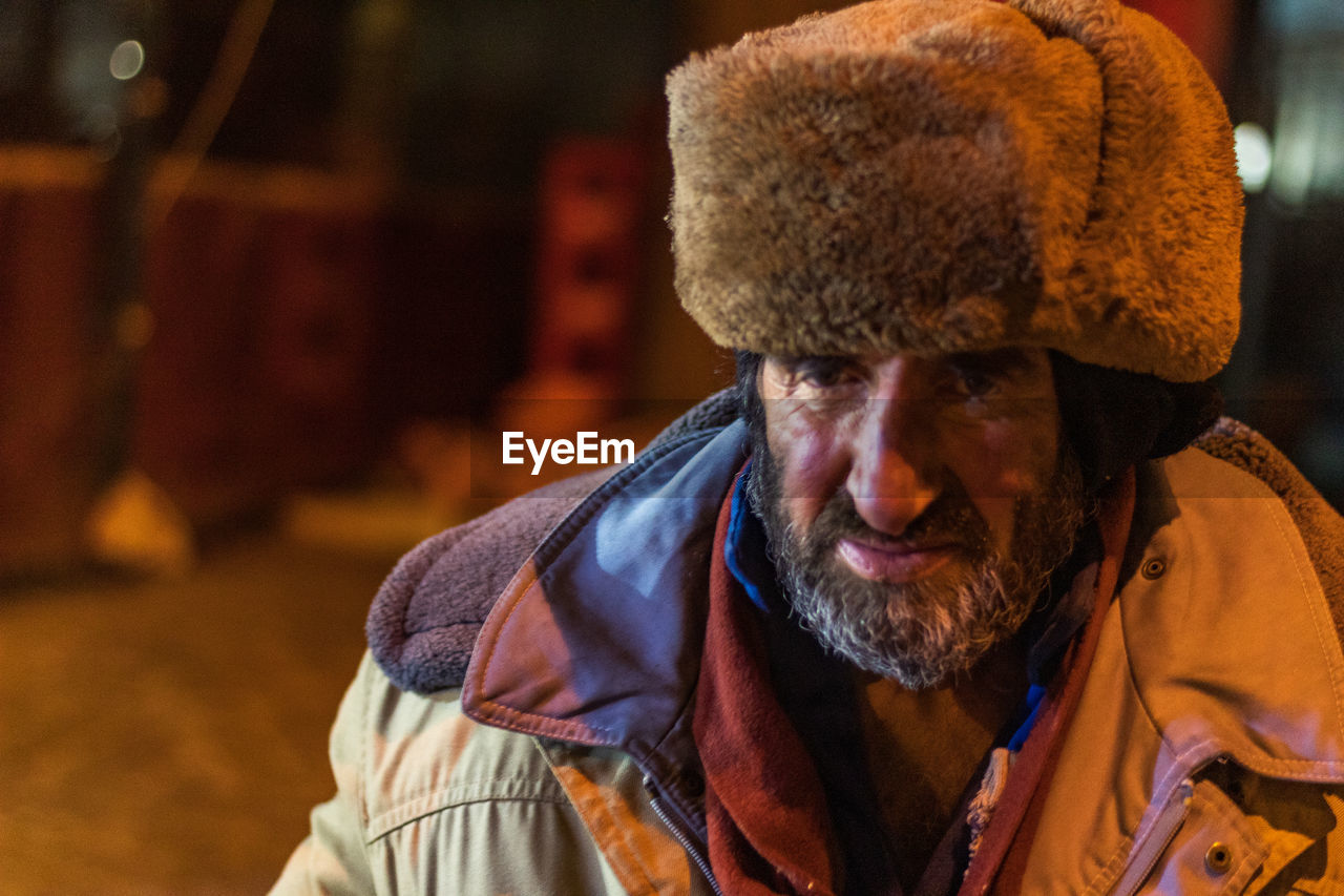 Close-up of man wearing hat during winter