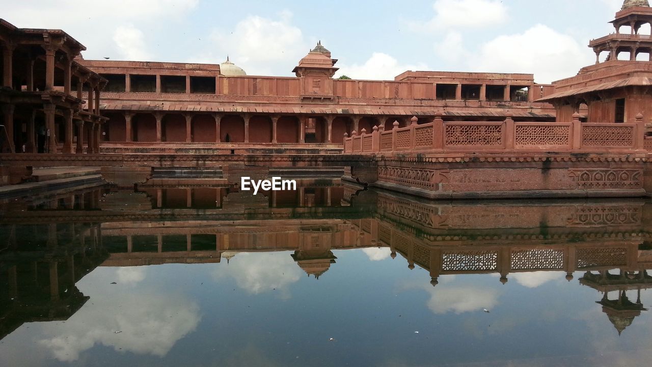 Reflection of fort on pond
