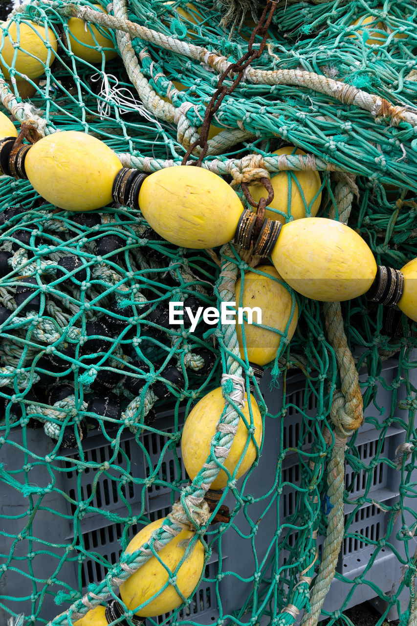 Close-up of fishing nets on crate