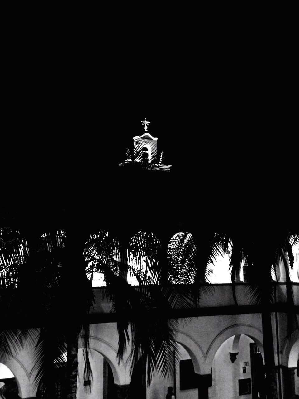 LOW ANGLE VIEW OF BUILT STRUCTURE AGAINST SKY AT NIGHT