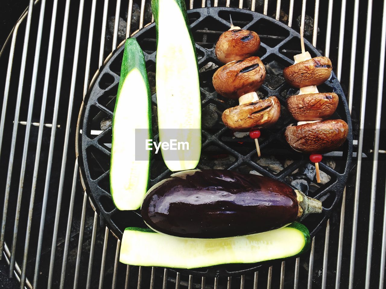 HIGH ANGLE VIEW OF VEGETABLES ON BARBECUE