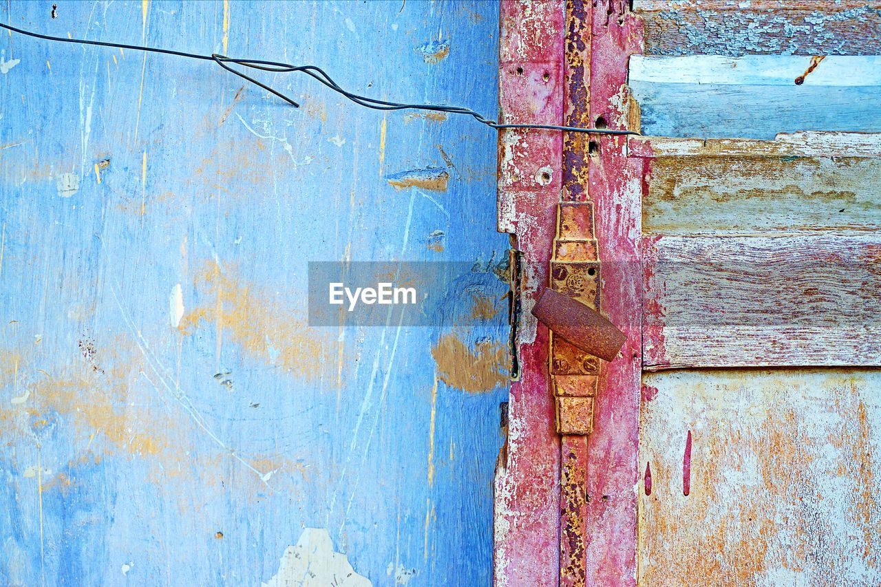 CLOSE-UP OF BLUE DOOR