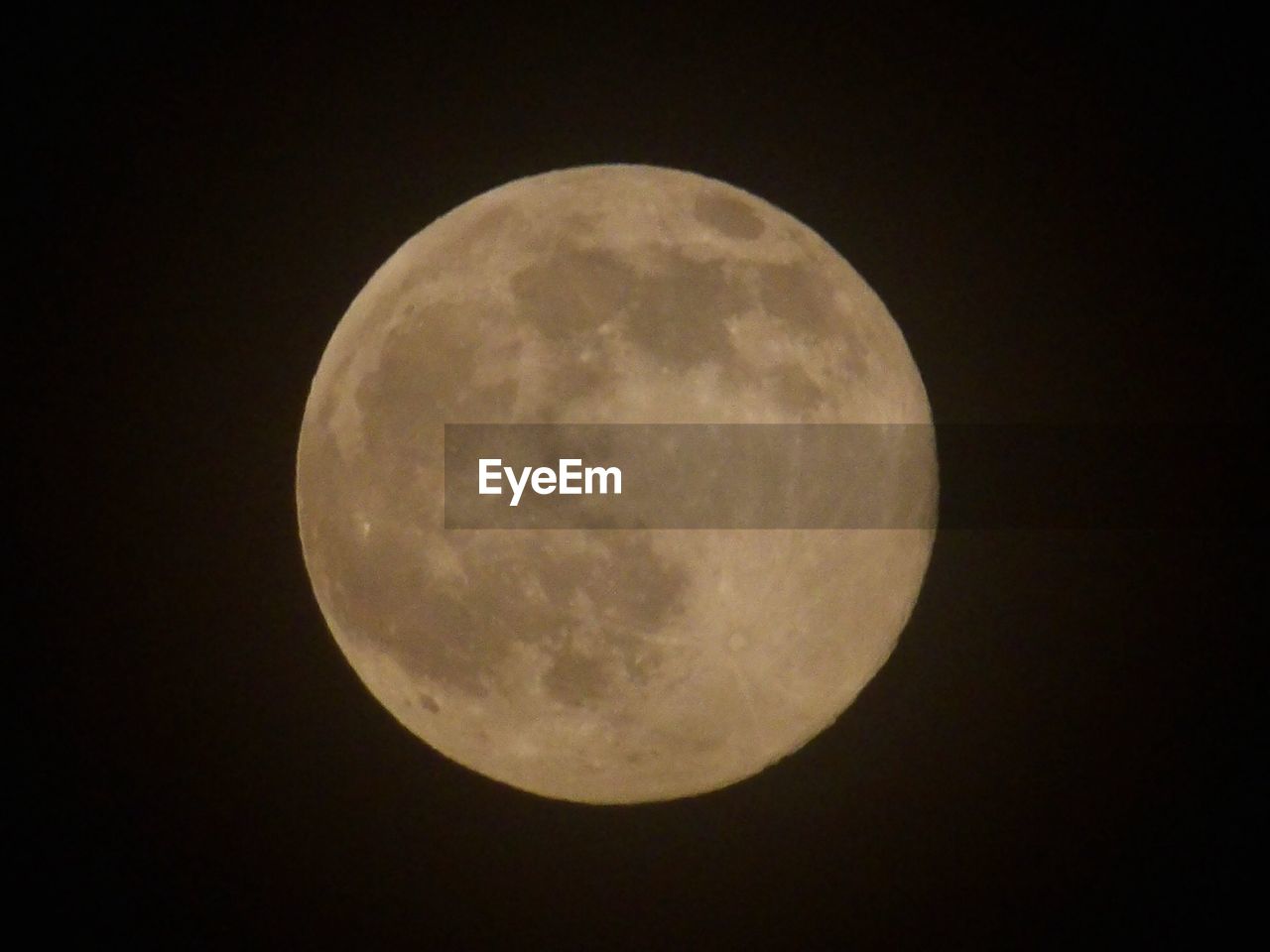 LOW ANGLE VIEW OF MOON IN SKY AT NIGHT