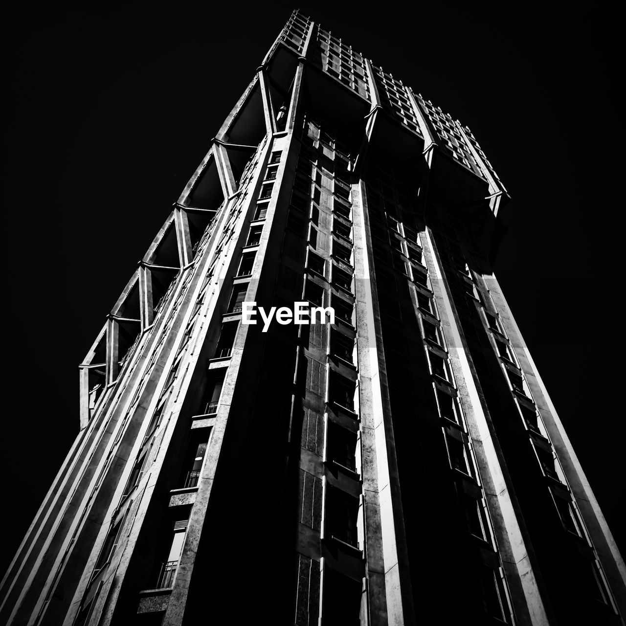 Low angle view of building against sky at night