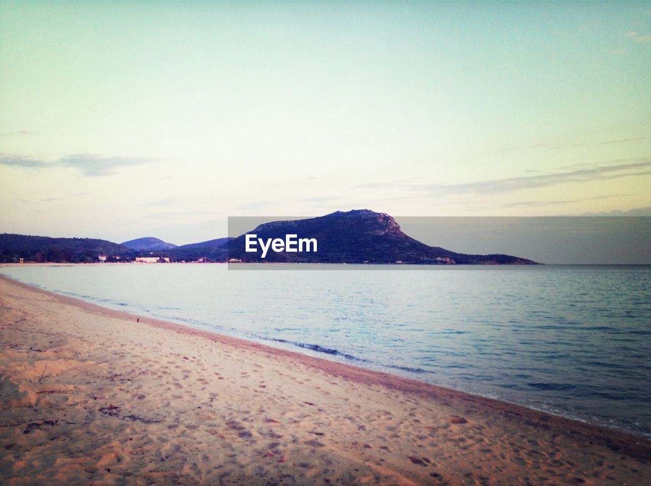 Seashore with mountain in background