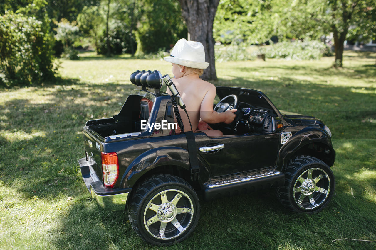 Toddler in ride-in car