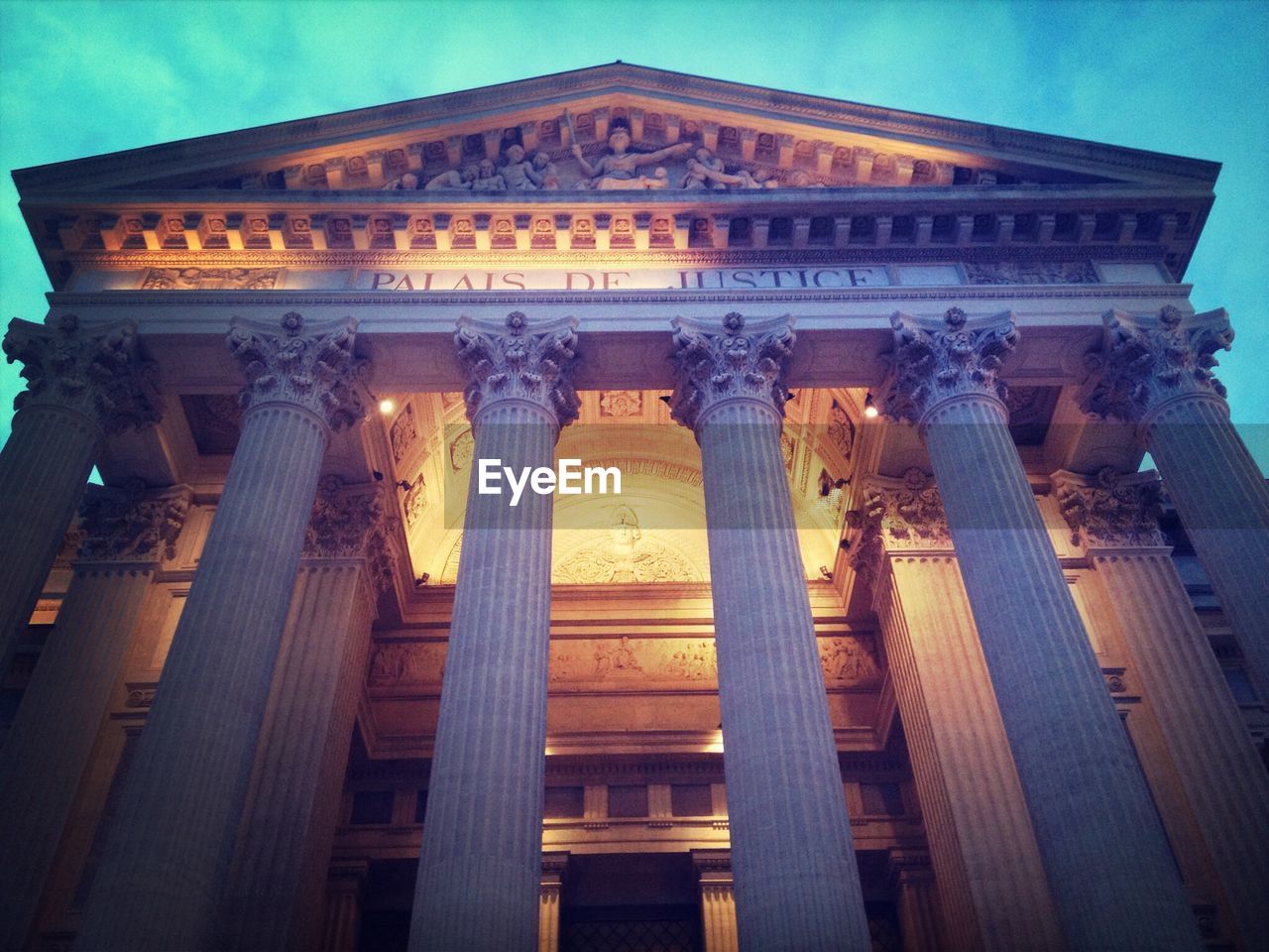 Low angle view of palais de justice at nimes