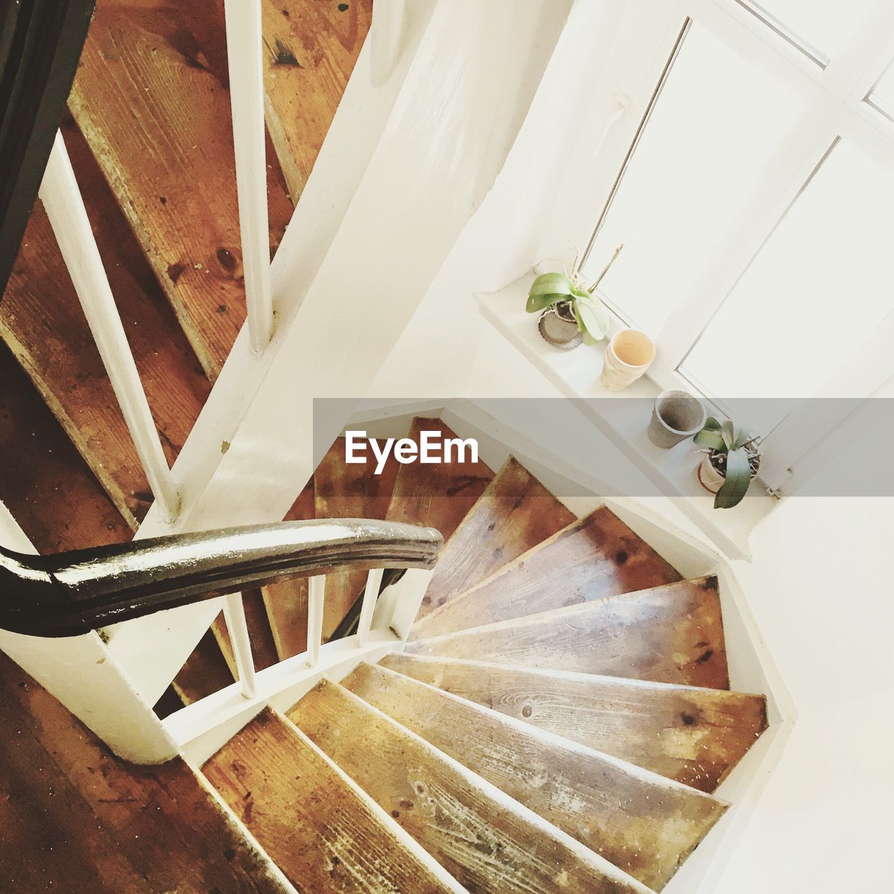 High angle view of wooden spiral staircase