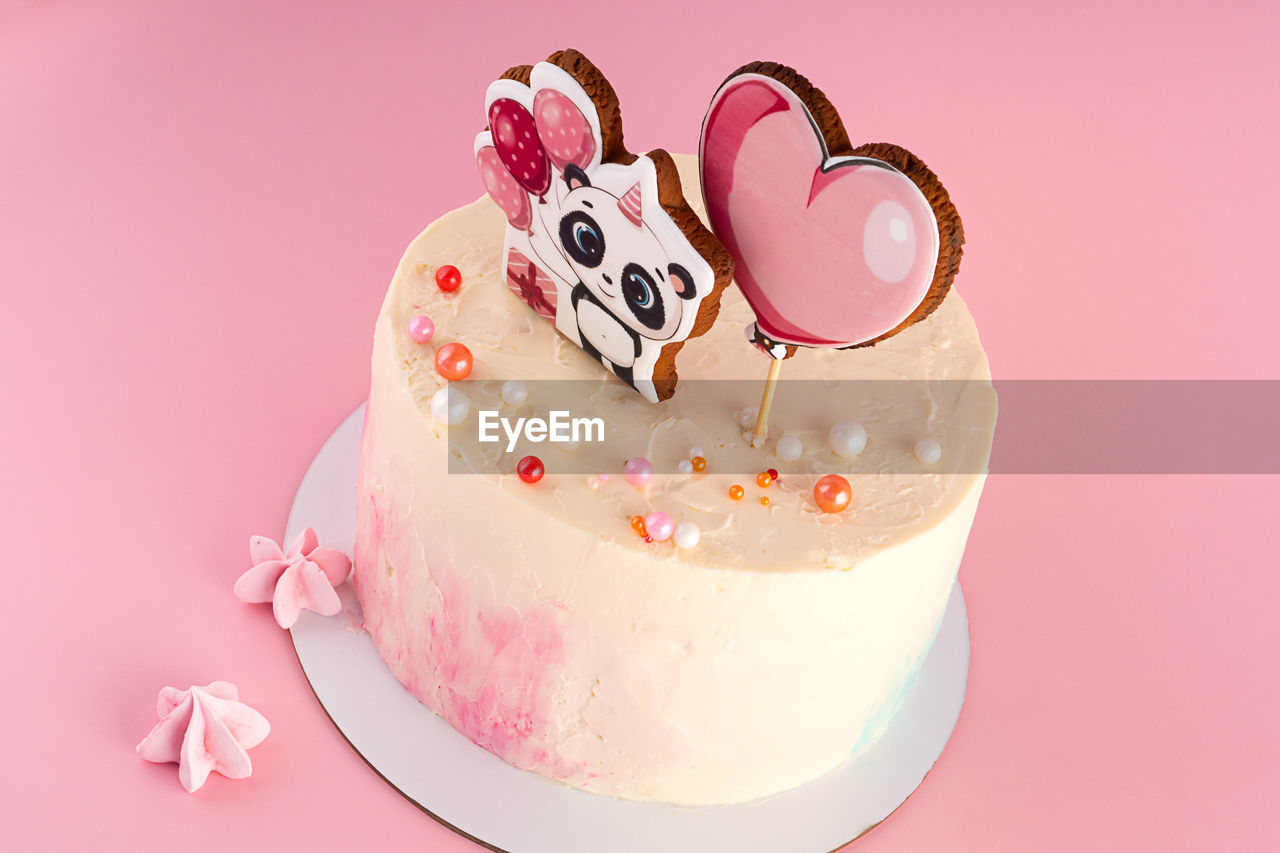 high angle view of cake on pink background