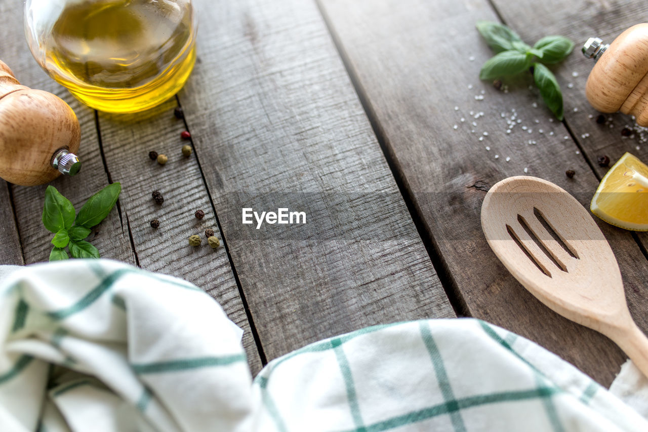 Different seasonings, cooking sauce, mayonnnasie, garlic sauce, seasoning on wooden background