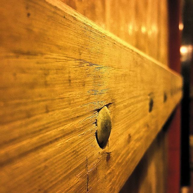 WOODEN PLANK ON WOODEN WALL