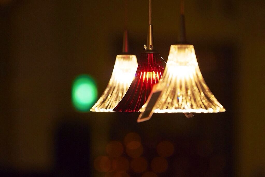 Close-up of hanging lights against blurred background