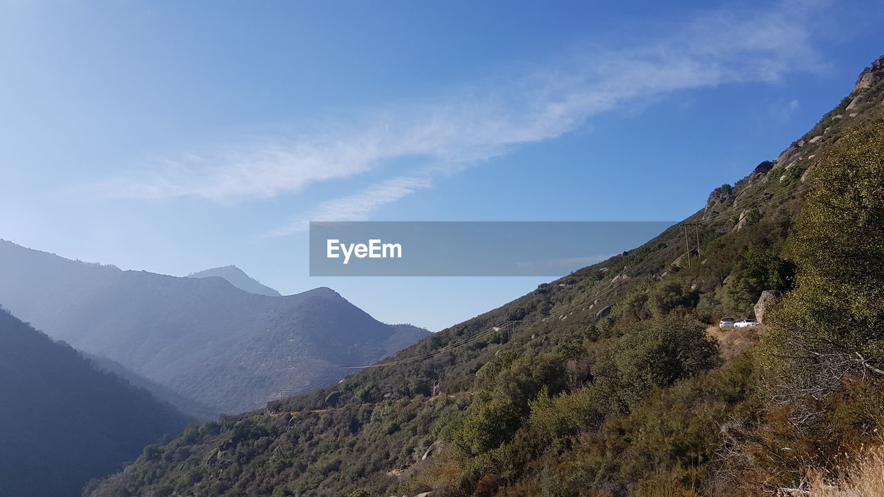 MOUNTAINS AGAINST SKY