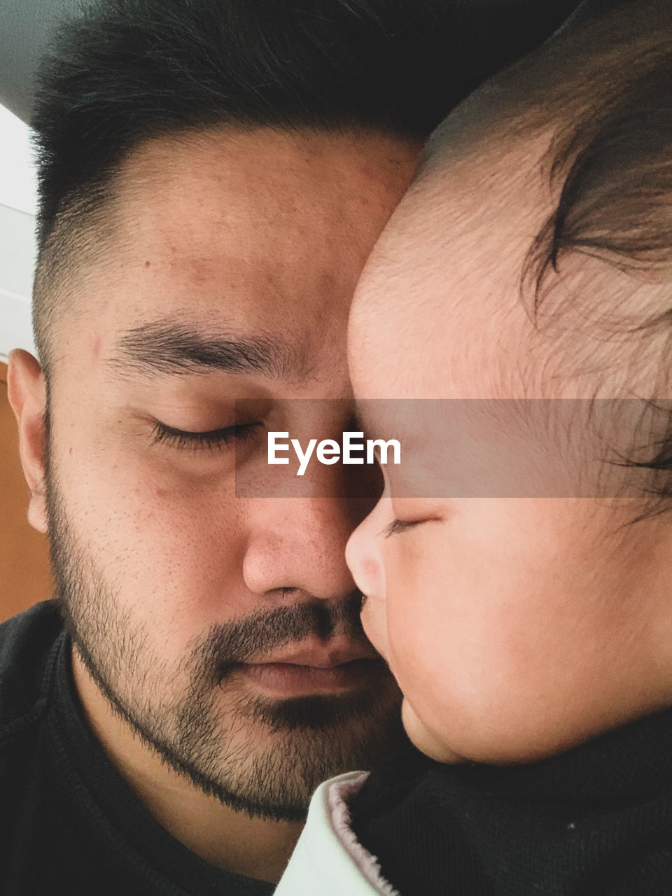 Close-up of father and daughter 