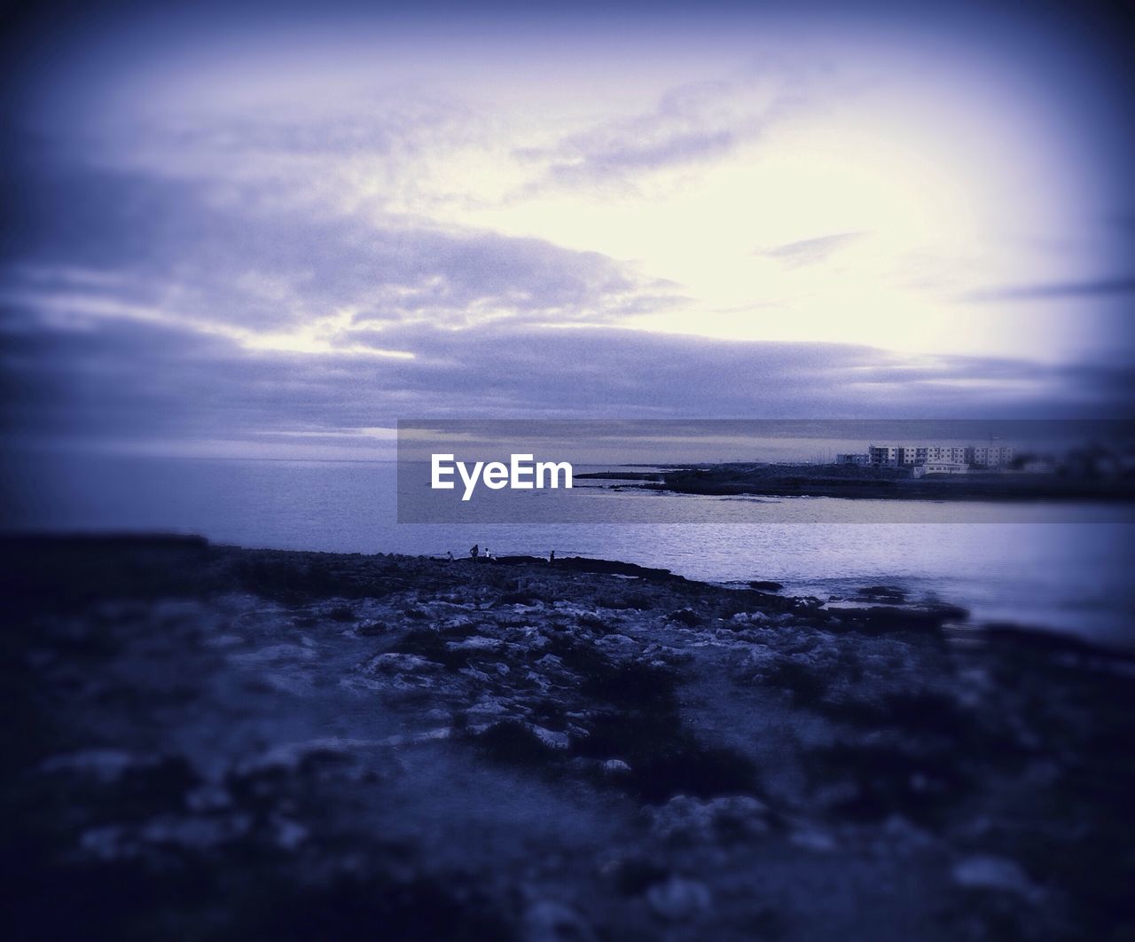 View of calm beach against the sky