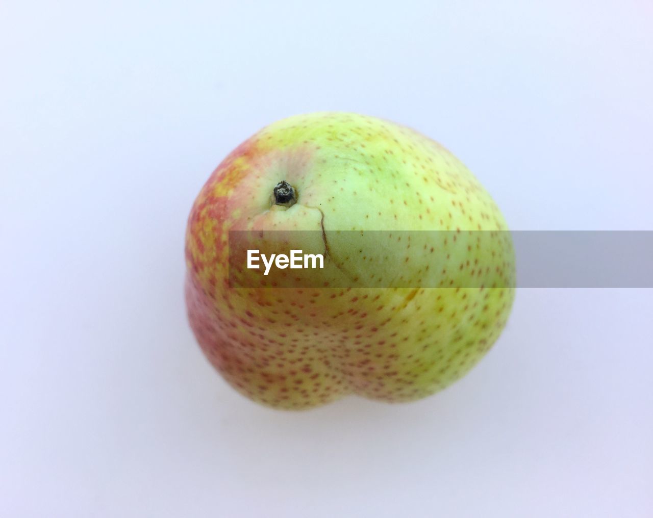 CLOSE-UP OF FRUITS AGAINST WHITE BACKGROUND