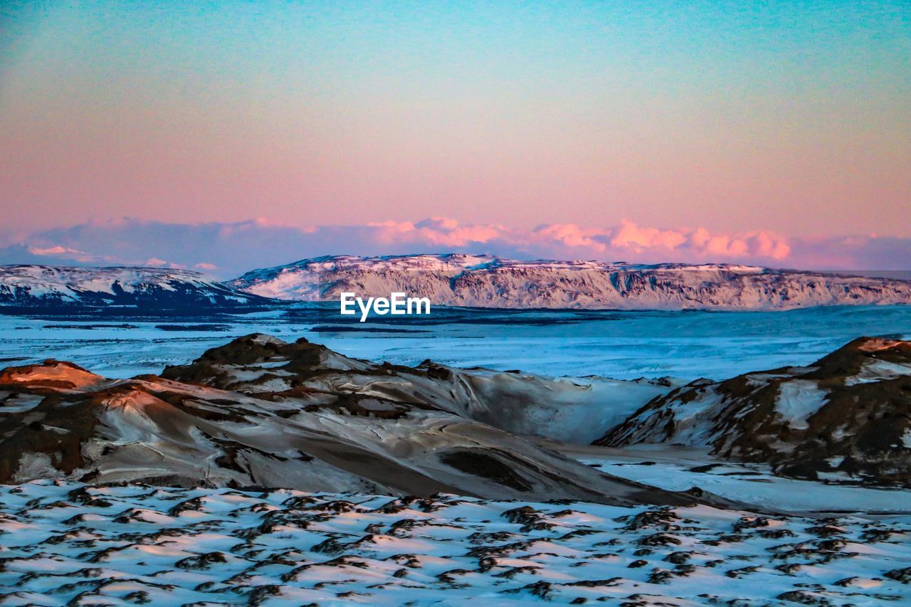 Scenic view of sea against sky during winter