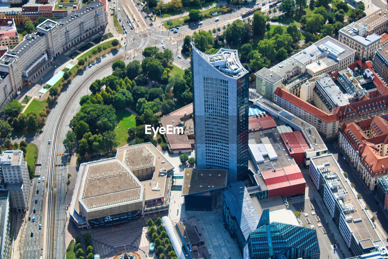 HIGH ANGLE VIEW OF BUILDINGS AND STREET IN CITY