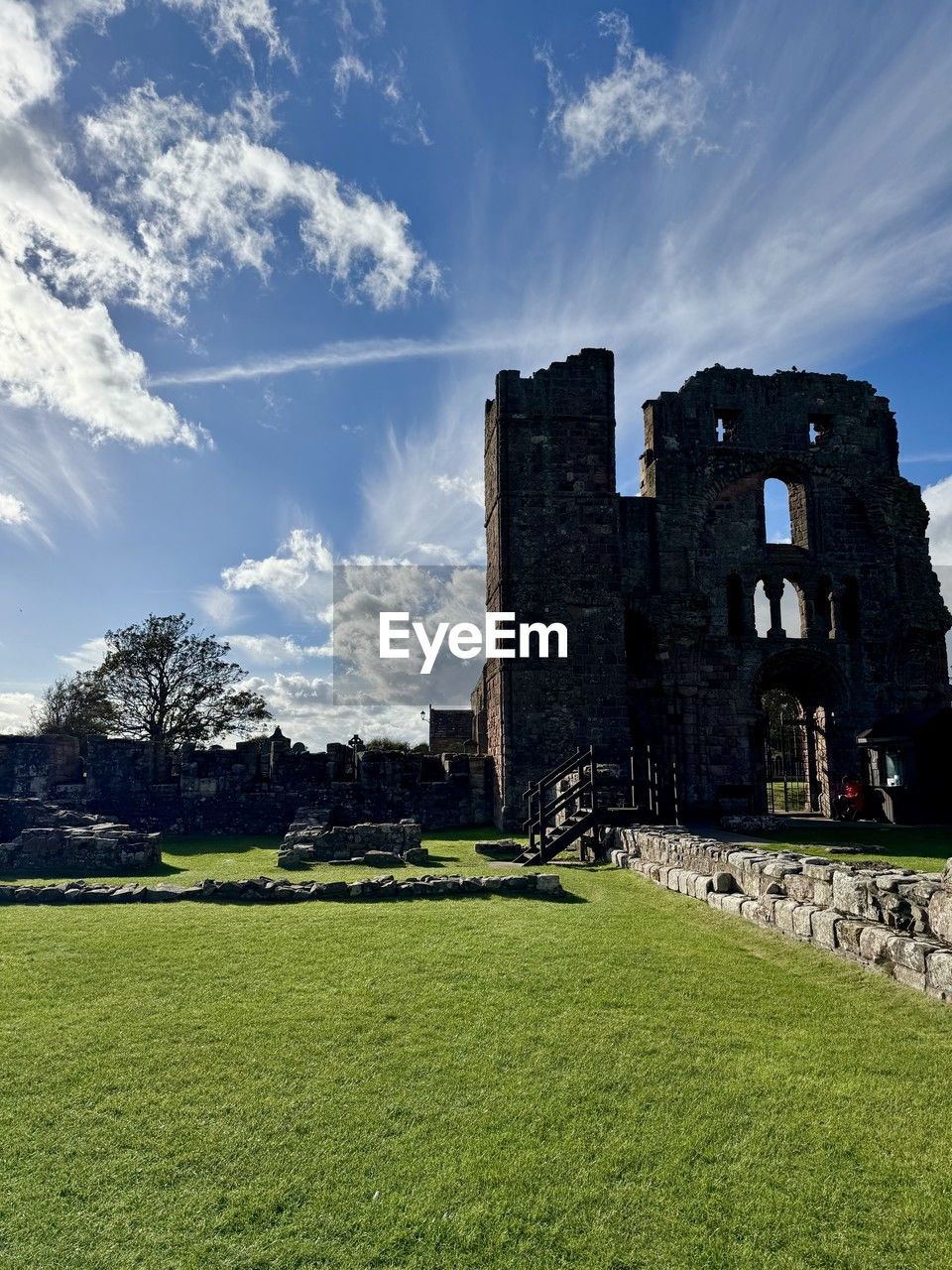 architecture, sky, history, built structure, the past, grass, building exterior, nature, cloud, plant, castle, building, travel destinations, rural area, old ruin, travel, no people, château, ruins, landscape, ancient, land, old, outdoors, fort, tourism, green, tree, blue, sunlight, day, hill, medieval, house