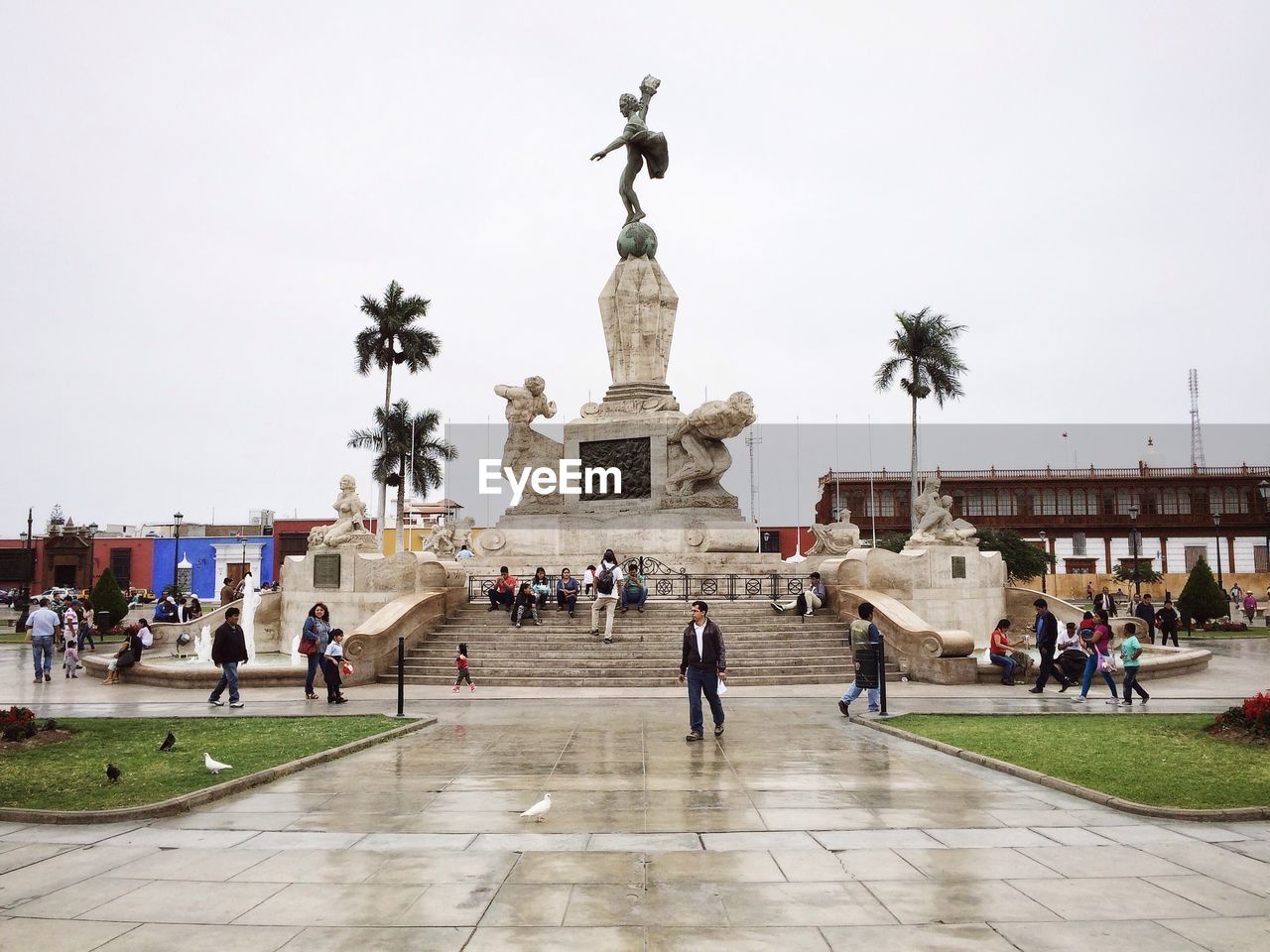 People traveling at freedom monument