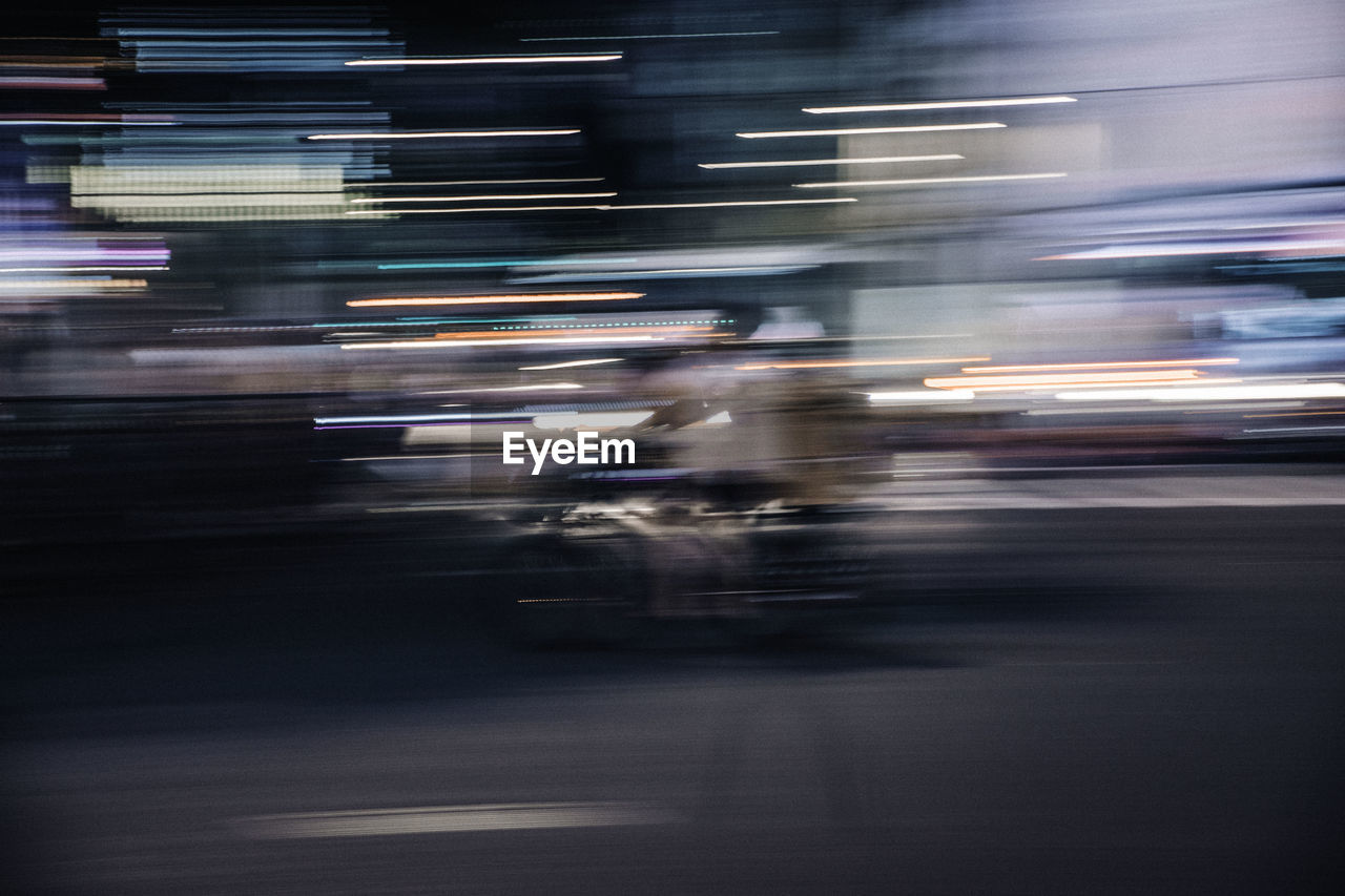 Blurred motion of traffic on city street at night