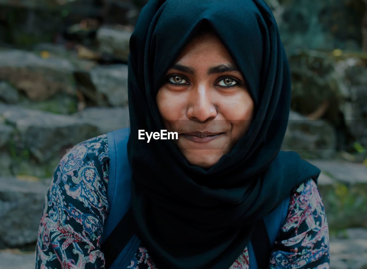 Close-up portrait of smiling teenager